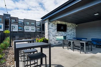 private patio with tables and chairs